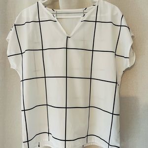 White and black checkered blouse